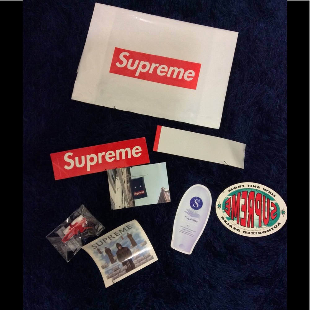 Supreme stickers, bag, and toy soldier